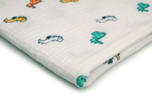 Musselin mit Aufdruck, Bunte Dinosaurier